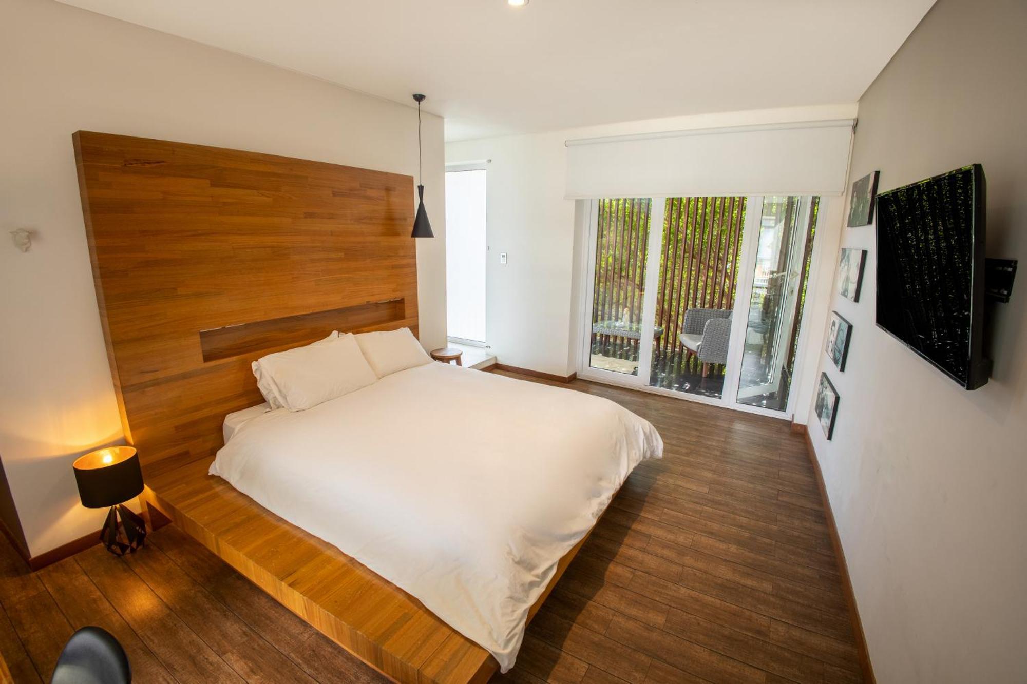 Cosmopolitano Hotel Boutique Santa Cruz de La Sierra Exterior photo A bedroom at the hotel