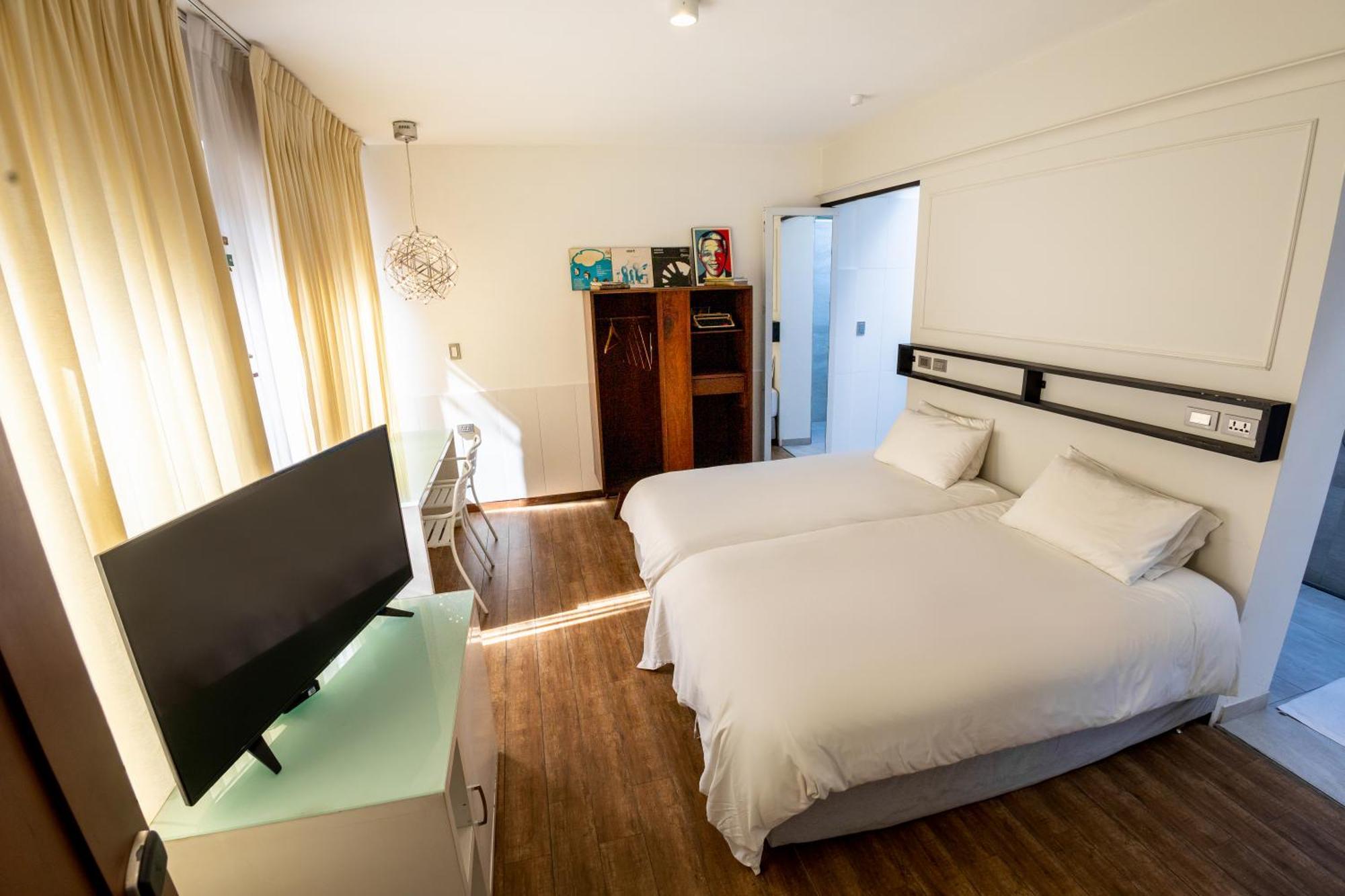 Cosmopolitano Hotel Boutique Santa Cruz de La Sierra Exterior photo A room at the hotel